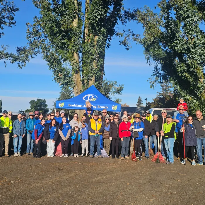 Volunteers gathered under the BAB tent